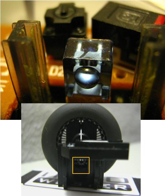 Na imagem maior, um sensor que lê as entradas da roda (imagem menor)